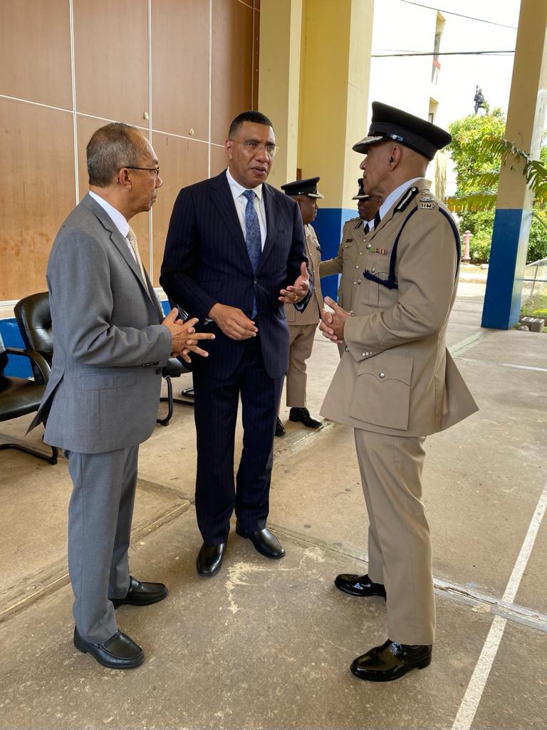 Photo Caption: Prime Minister, the Most. Hon. Andrew Holness (center), Deputy Prime Minister and Minister of National Security, the Hon. Dr. Horace Chang (left) and Commission of Police, Major General Antony Anderson (right) engage in a light discussion at the Jamaica Constabulary Force's Passing Out Parade Ceremony. Over 300 new Police Constables successfully matriculated into the Force. The Ceremony was held at the National Police College of Jamaica on Wednesday, September 14.